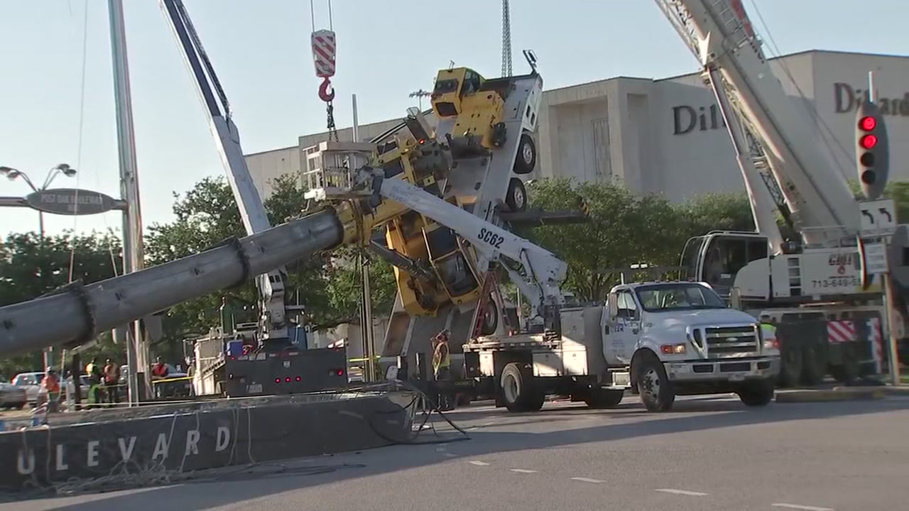 Crews working to remove toppled crane from Galleria intersection